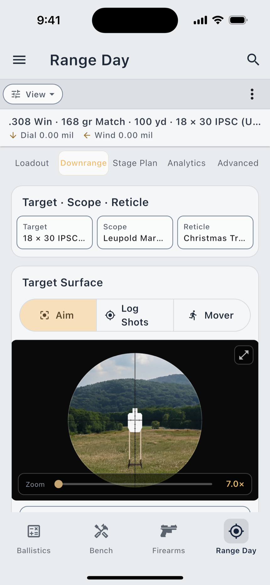 Range Day on iPhone, light appearance: the Scenic scope view, a steel target downrange behind the reticle.
